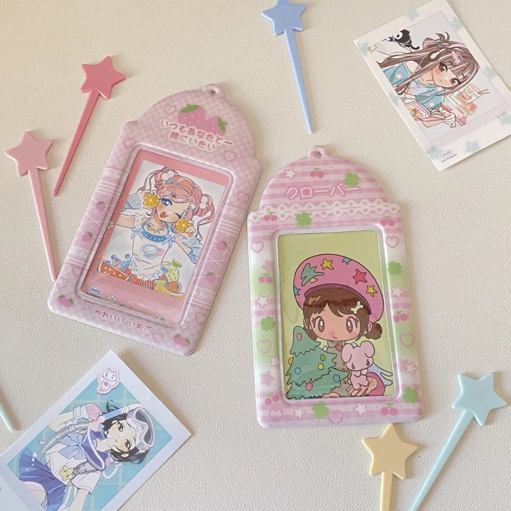 Transparent PVC card holder with cartoon strawberry or four-leaf clover design, measuring 7.6 by 13.6 cm.