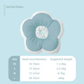 Cotton flower print collar for cats on a table, showing adjustable strap and solar flower design.