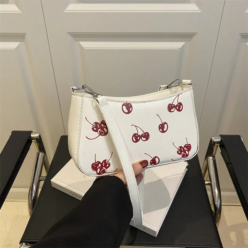 Dumpling-shaped PU underarm bag with floral print, single shoulder strap, three-dimensional outer pocket, in khaki.
