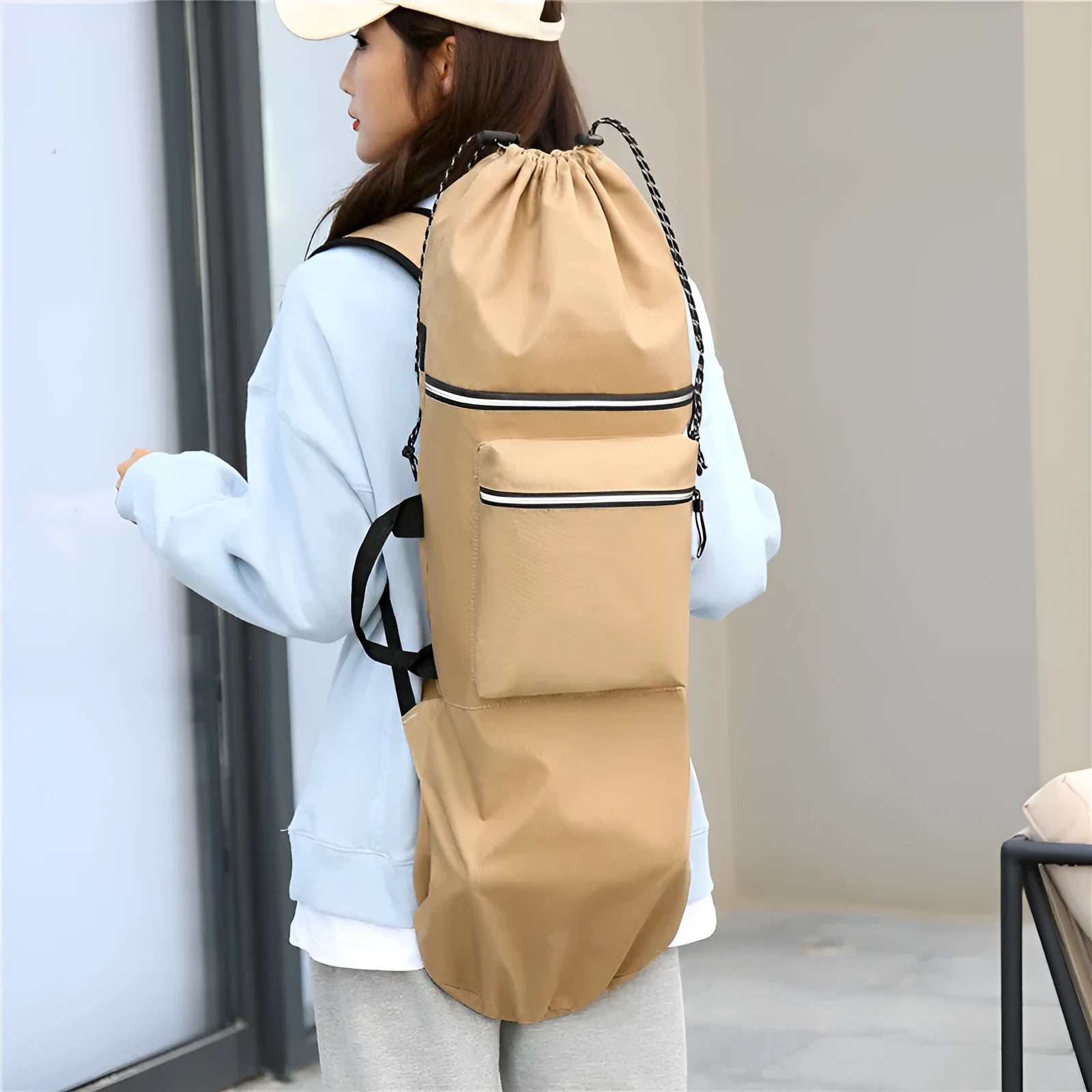 Lightweight waterproof skateboard backpack in black nylon with skateboard storage compartment