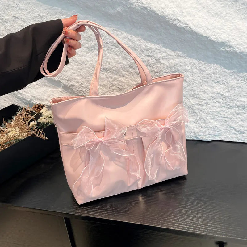 College style bow tote bag with double shoulder straps and large capacity interior