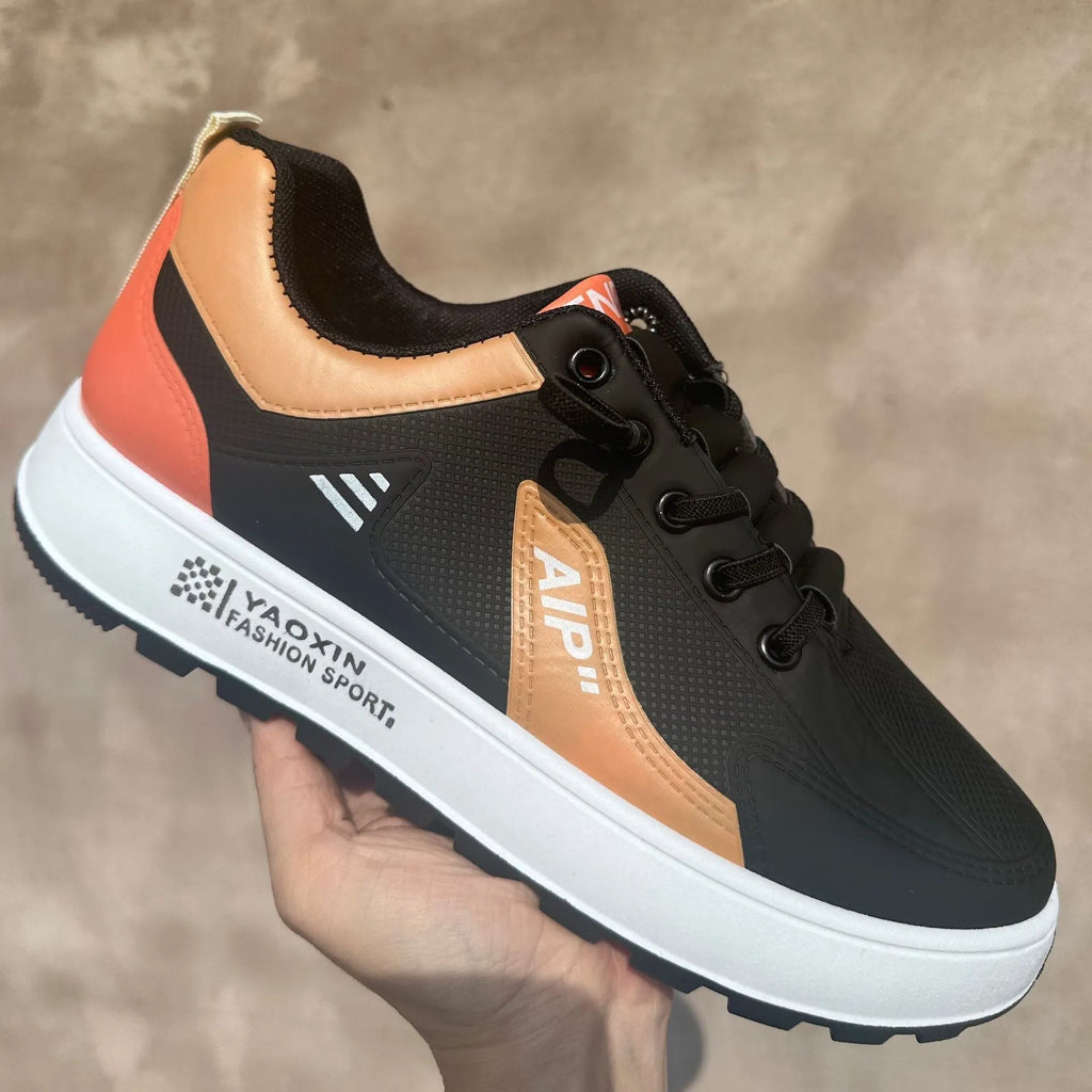 Men's casual shoes in artificial PU with round toe design, shown in white orange colour combination