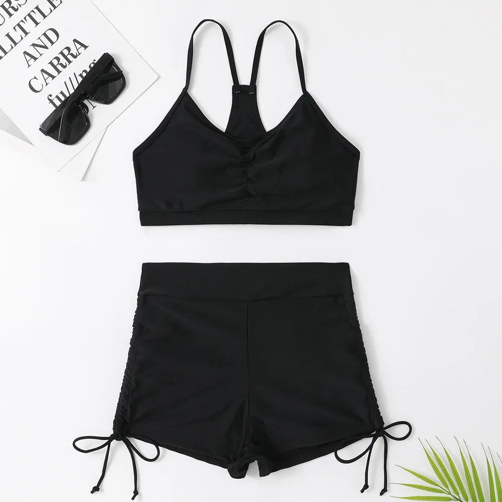 Women's purple high waist split bikini swimsuit with lining, showing top and shorts.