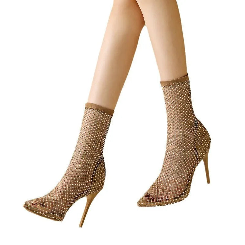 Gold women's high heel sandals with mesh uppers and pointed stiletto design