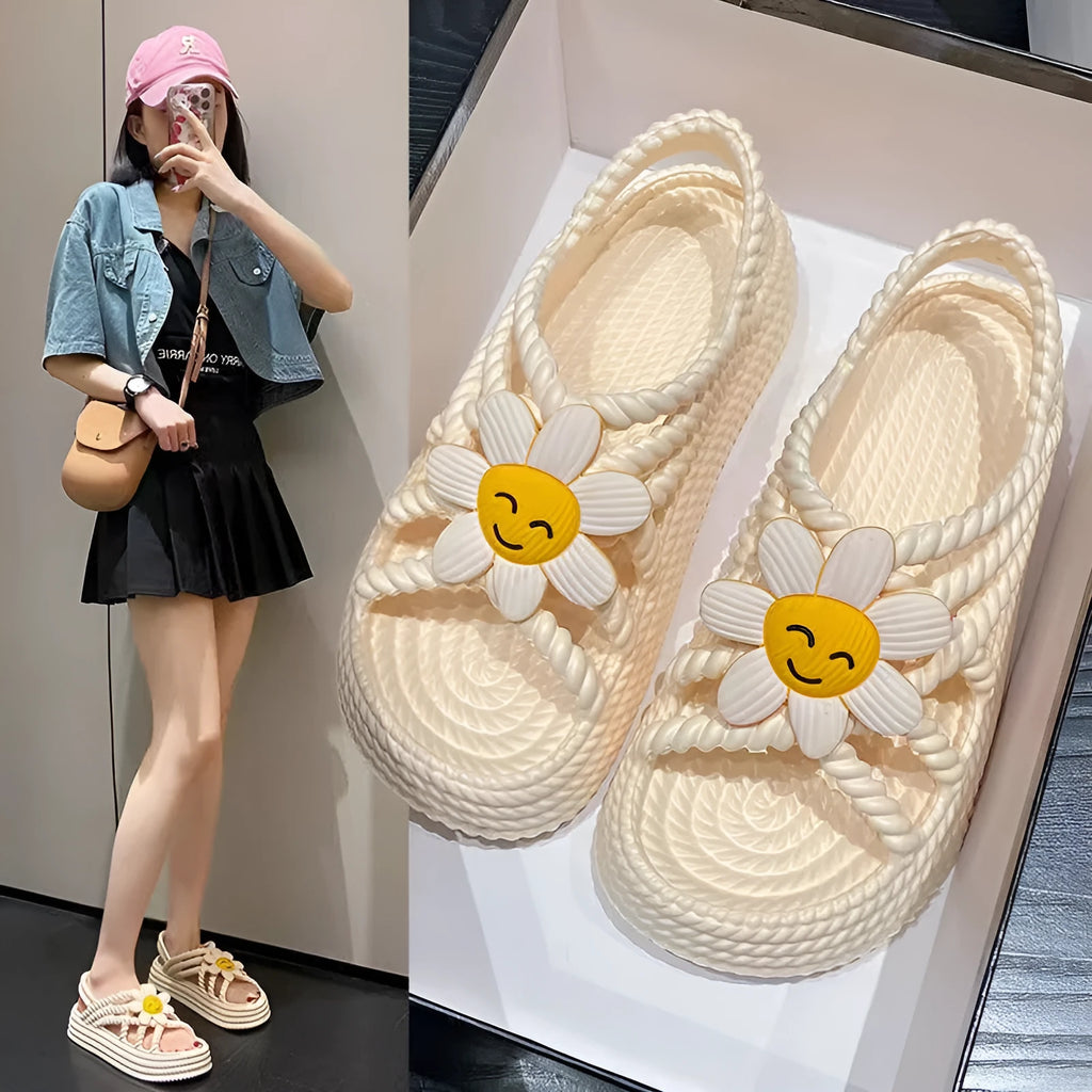 Women's PVC sandals with flower designs and non-slip soles in beige and black colours
