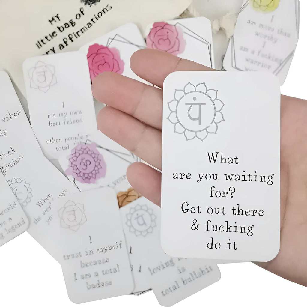 Set of 16 colourful funny affirmation cards in a greeting card bag.