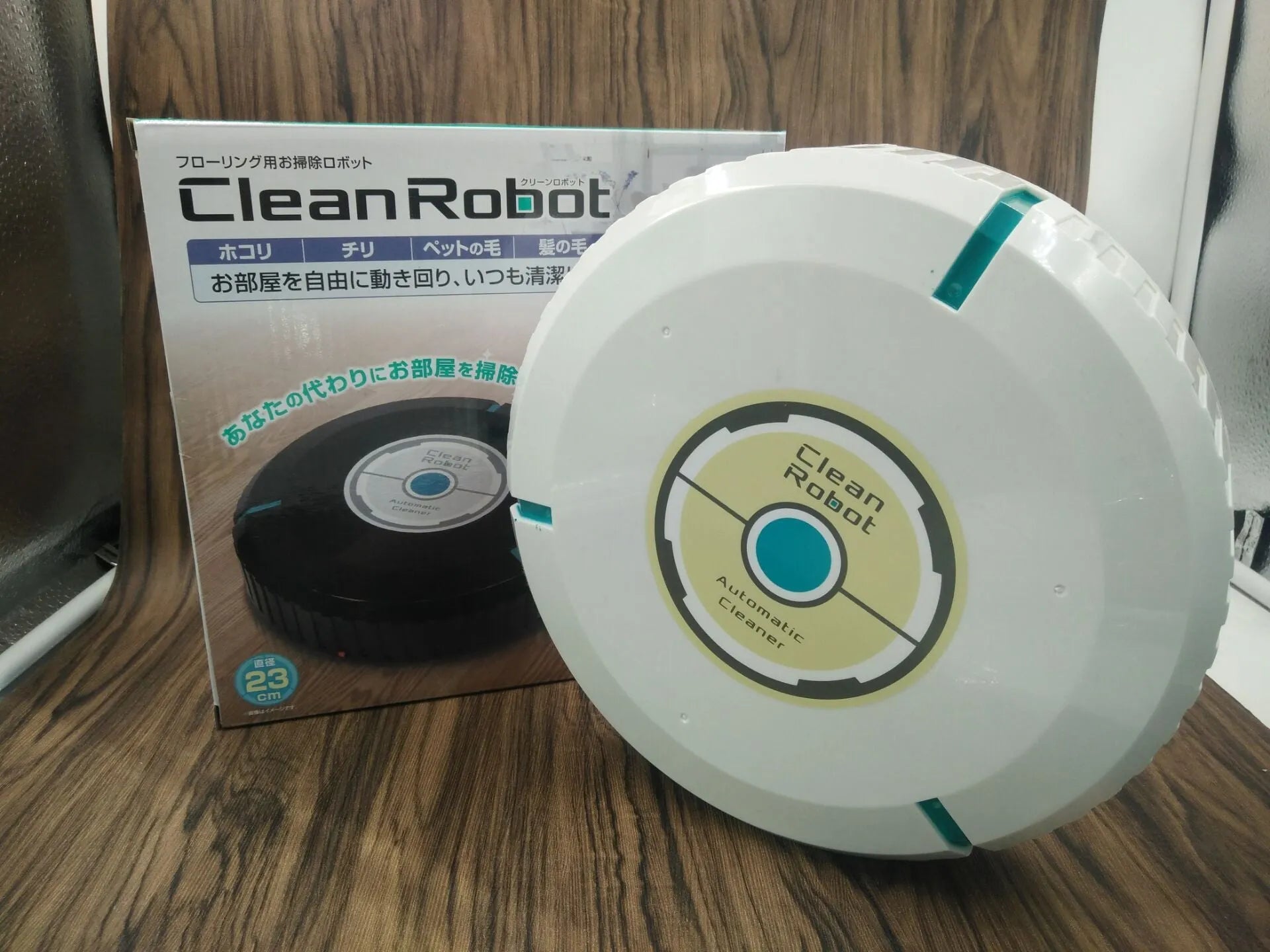 Black or white AC Sweeping Robot automatic floor cleaner on wooden floor