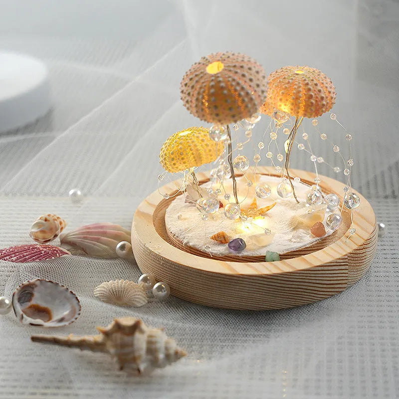 Handmade sea urchin shell jellyfish lamp with cylindrical glass cover and built-in battery, small night lamp