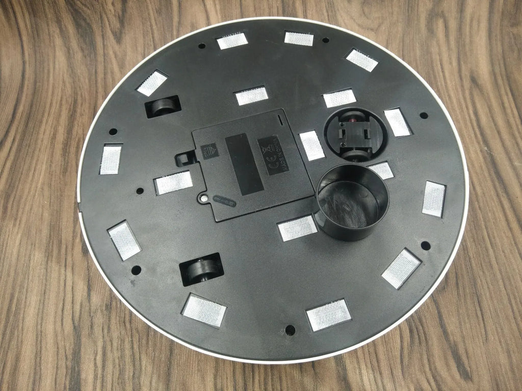 Black or white AC Sweeping Robot automatic floor cleaner on wooden floor