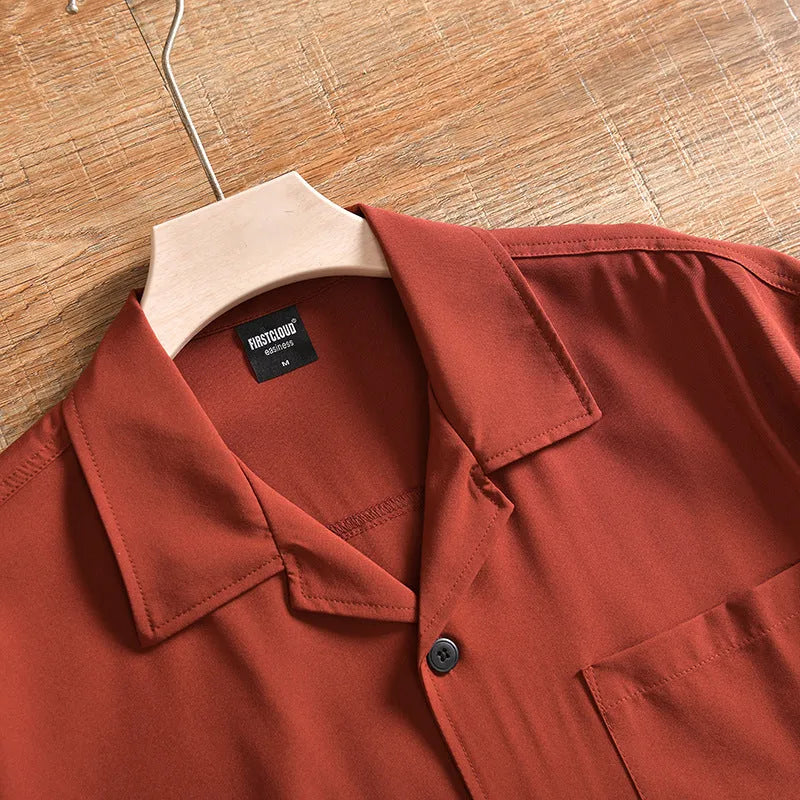 Men's loose fit lightweight short sleeve shirt in a solid colour, showing front design.