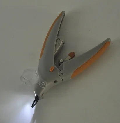 LED pet nail clipper with viewing window and blood line guide for dogs and cats