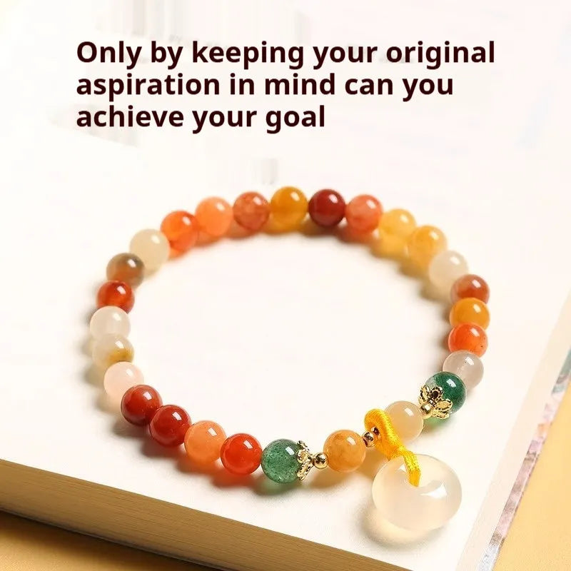 Handmade Chinese style bracelet with natural jinsi jade beads and traditional safety clasp