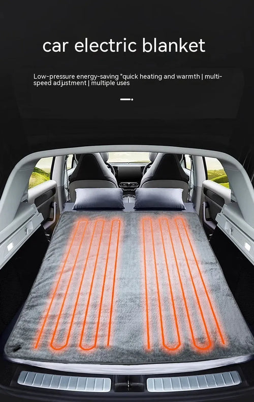 Grey 12V car electric blanket with digital controller, shown plugged into a car cigarette lighter socket.