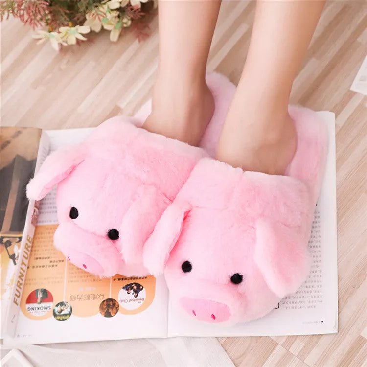 Pink pig design floor slippers made from short plush with PP cotton filling.