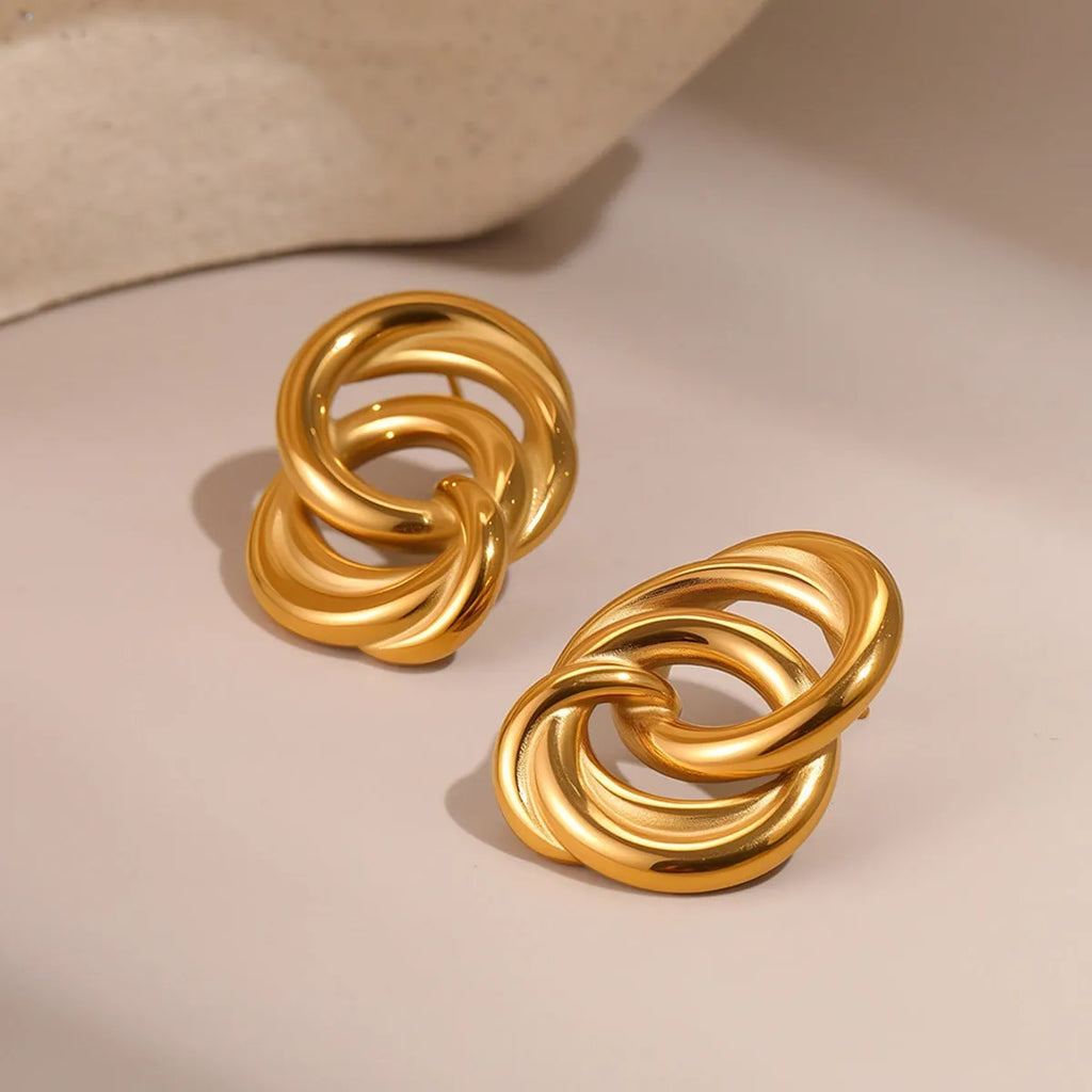 Minimalist geometric circle stud earrings in gold, stainless steel with electroplating and 18K purity