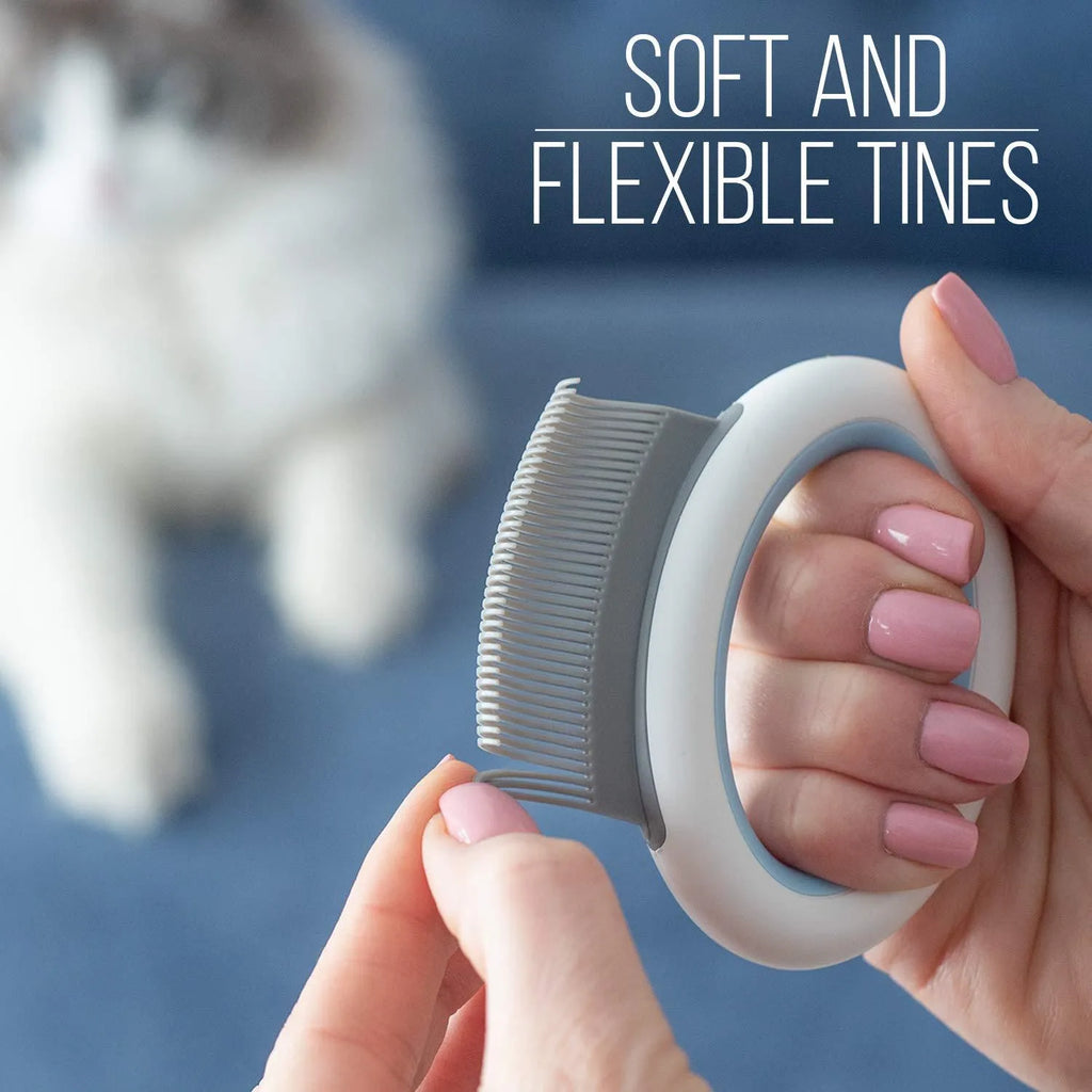 Blue pet deshedding comb with soft teeth and ergonomic plastic handle for grooming cats and dogs.
