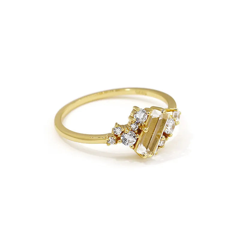 White crystal shiny electroplated silver women's ring on a white background