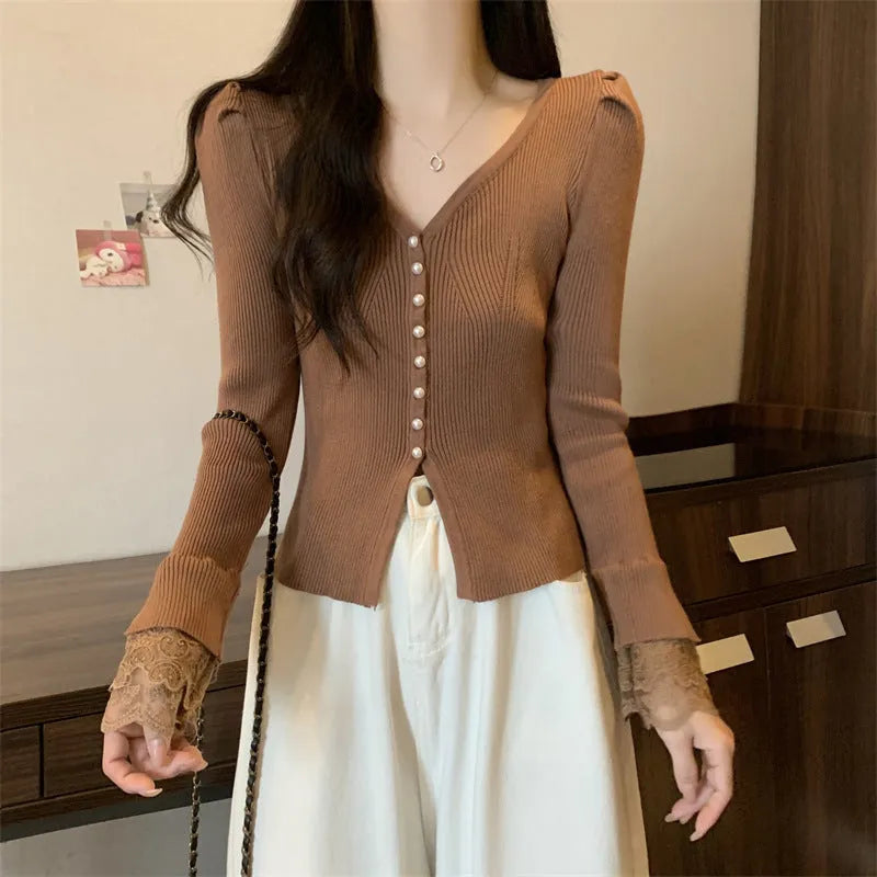 V-neck slim fit long sleeve top in mercerized cotton with lace stitching, shown in black, white, or brown, free size