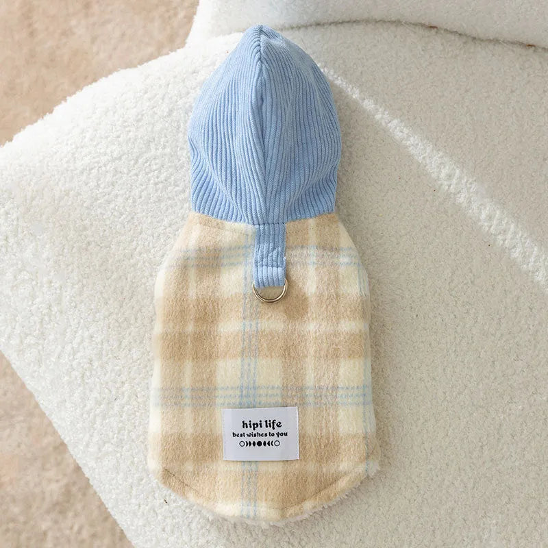 Blue corduroy dog vest with chessboard grid pattern and adjustable hood for winter wear