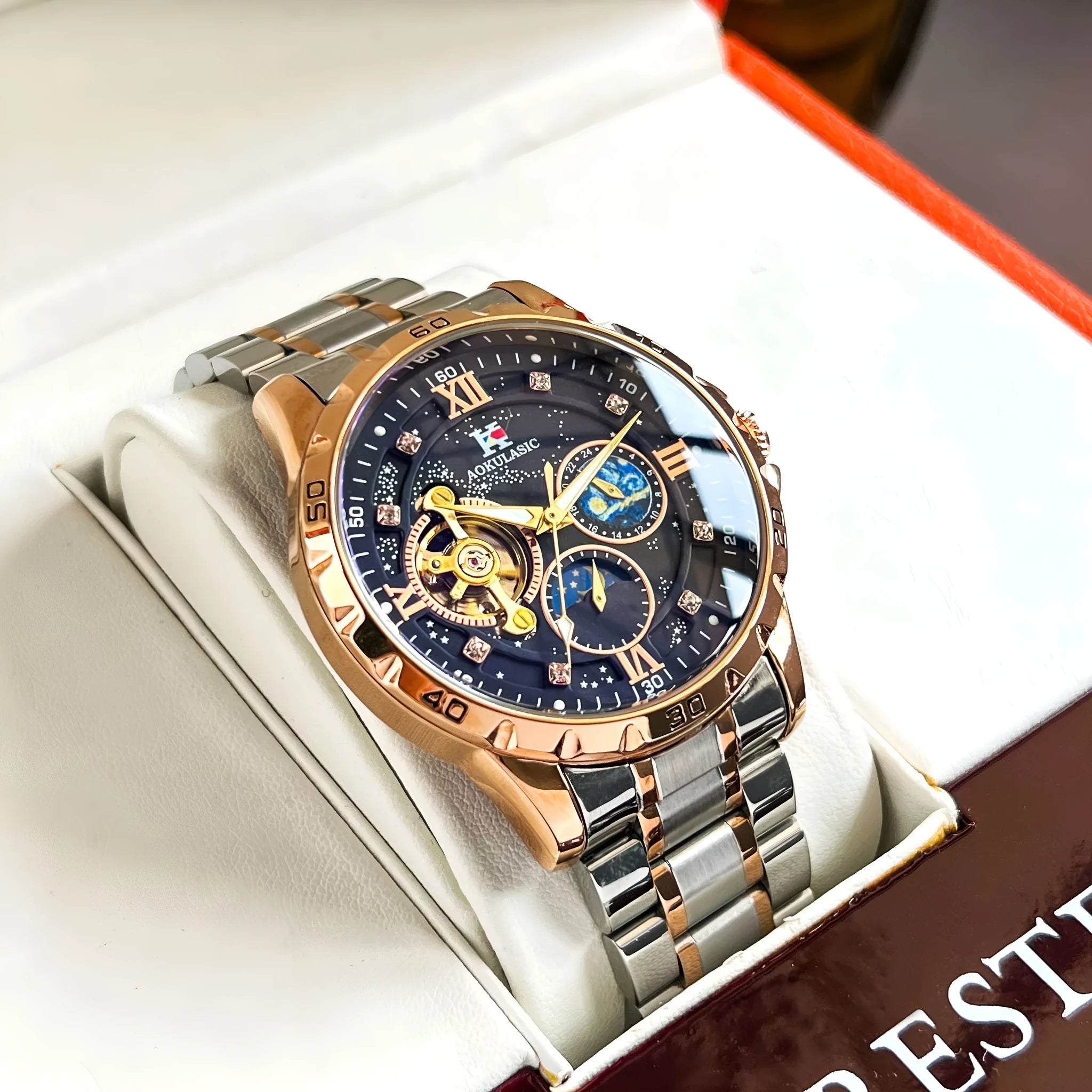 Automatic mechanical men's watch with rose gold case, black dial, and large multifunctional display