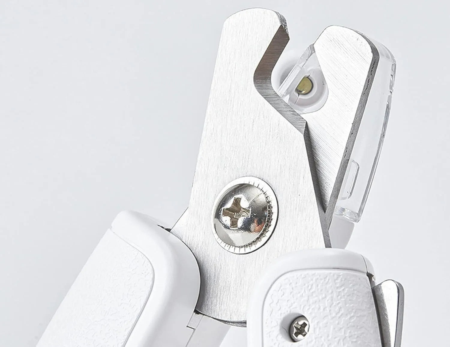 White LED pet nail clipper with transparent anti-splash guard and nail file.