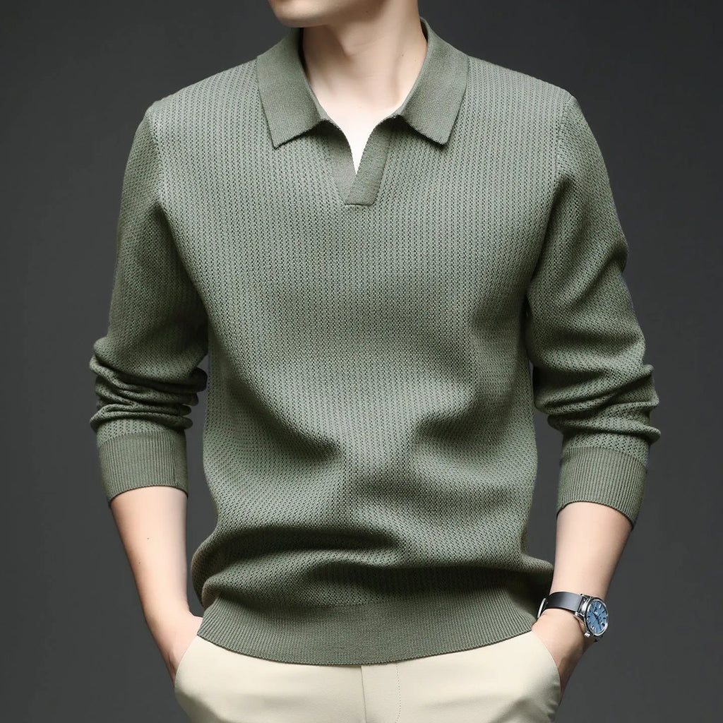 Men's loose-fitting casual pullover sweater in autumn colours on a hanger