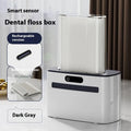 Intelligent induction dental floss box in dark grey, light grey, and gold colours showing automatic pop-up mechanism.