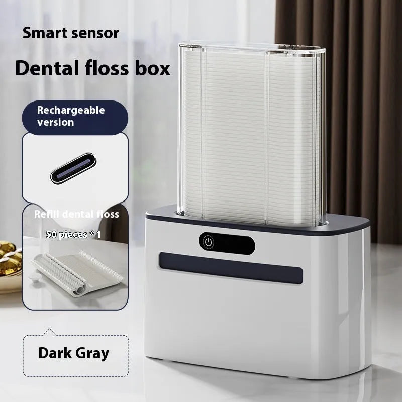 Intelligent induction dental floss box in dark grey, light grey, and gold colours showing automatic pop-up mechanism.