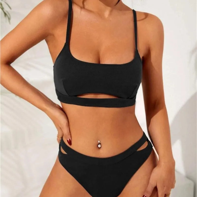Black hollow solid colour women's bikini set with sleeveless top and brief bottom on model