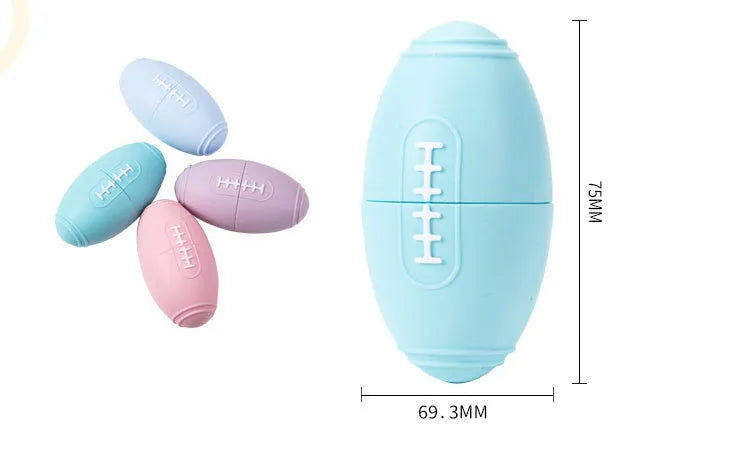 Silicone rugby-shaped dog toy with food leak hole, available in blue, light blue, pink, and purple.