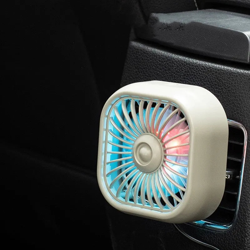 USB car fan with three-speed controls and charging cable for vehicle dashboard use