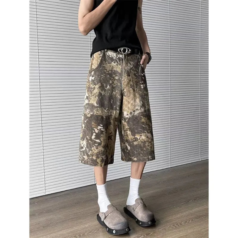 Yellow snake pattern camouflage cropped jeans on a model.