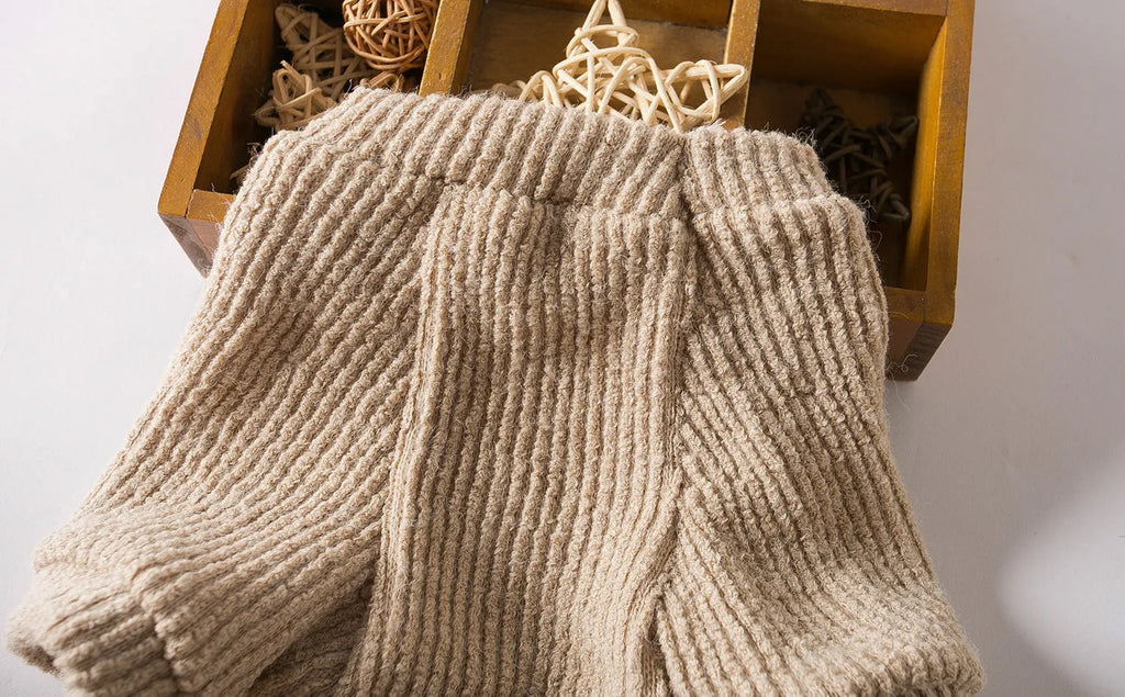 Brown knitted dog sweater pullover for small breeds like Bichon or Pomeranian on a white background