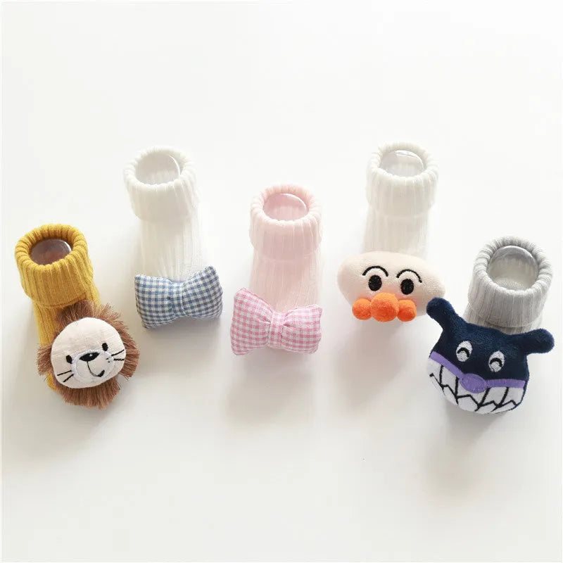 Cotton baby floor socks with anti-slip soles in animal designs for infants and toddlers