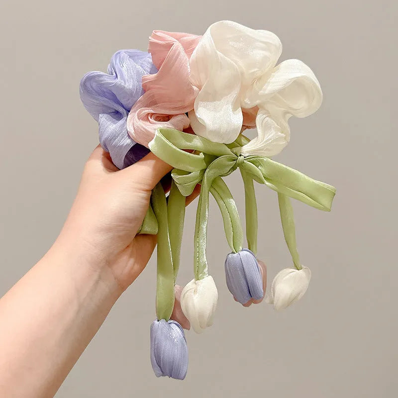 Children's knitted fabric headband with tulip element in Korean style, shown in beige, pink or purple colour option