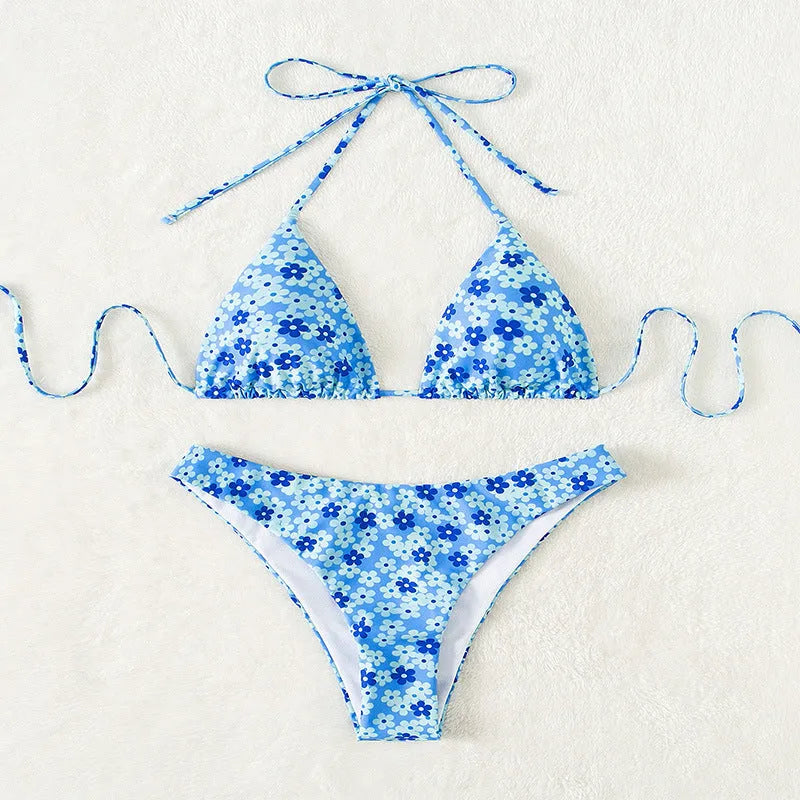 Blue printed women's swimsuit with lace-up front and matching shorts
