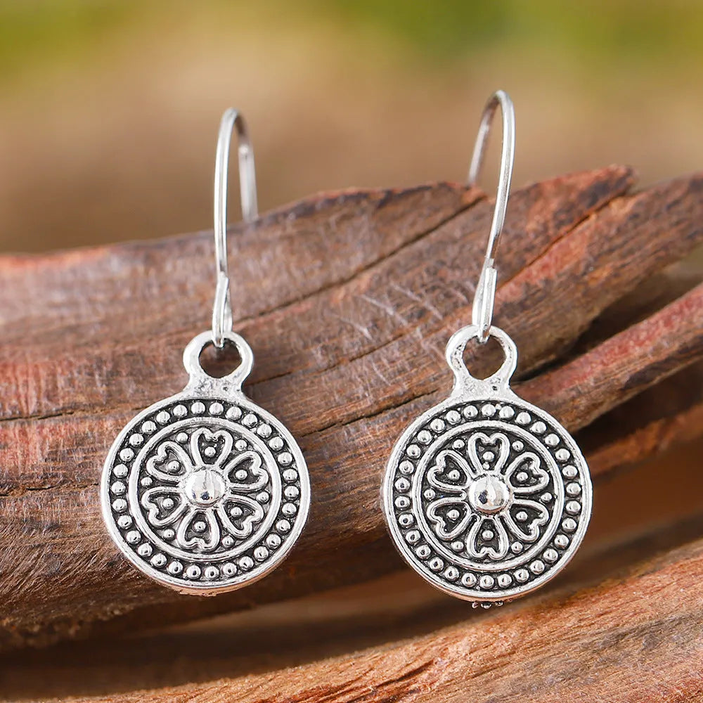 Geometric round zinc alloy earrings with distressed ethnic bohemian styling and electroplated finish