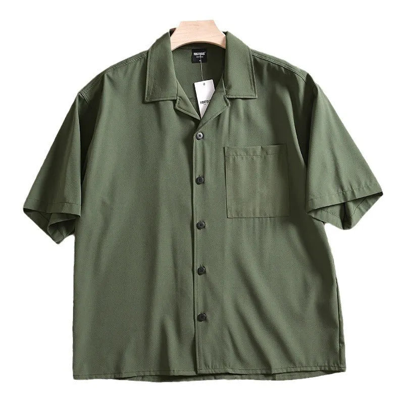 Men's loose fit lightweight short sleeve shirt in a solid colour, showing front design.