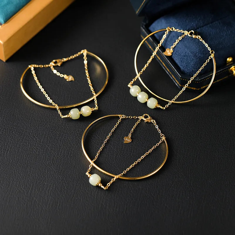 Women's Hetian jade bracelet with gold inlay design available in single, double or three bead versions