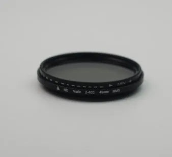 Adjustable multi-diameter ND camera filter kit with ND-2, ND-4, ND-8, and ND-400 filters and adapter rings