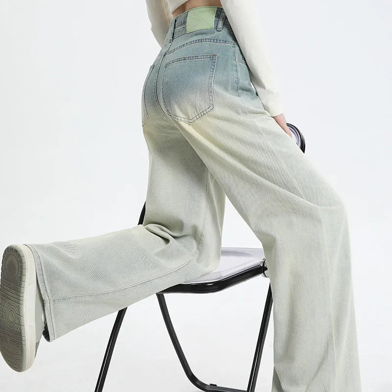 Women's gradient blue straight-leg jeans showing colour transition from lighter to darker blue tones