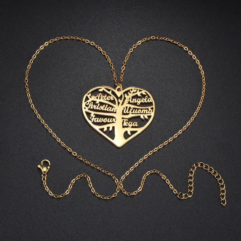 Custom stainless steel name necklace featuring a hollow heart and detailed life tree pendant in silver, gold, or rose gold.