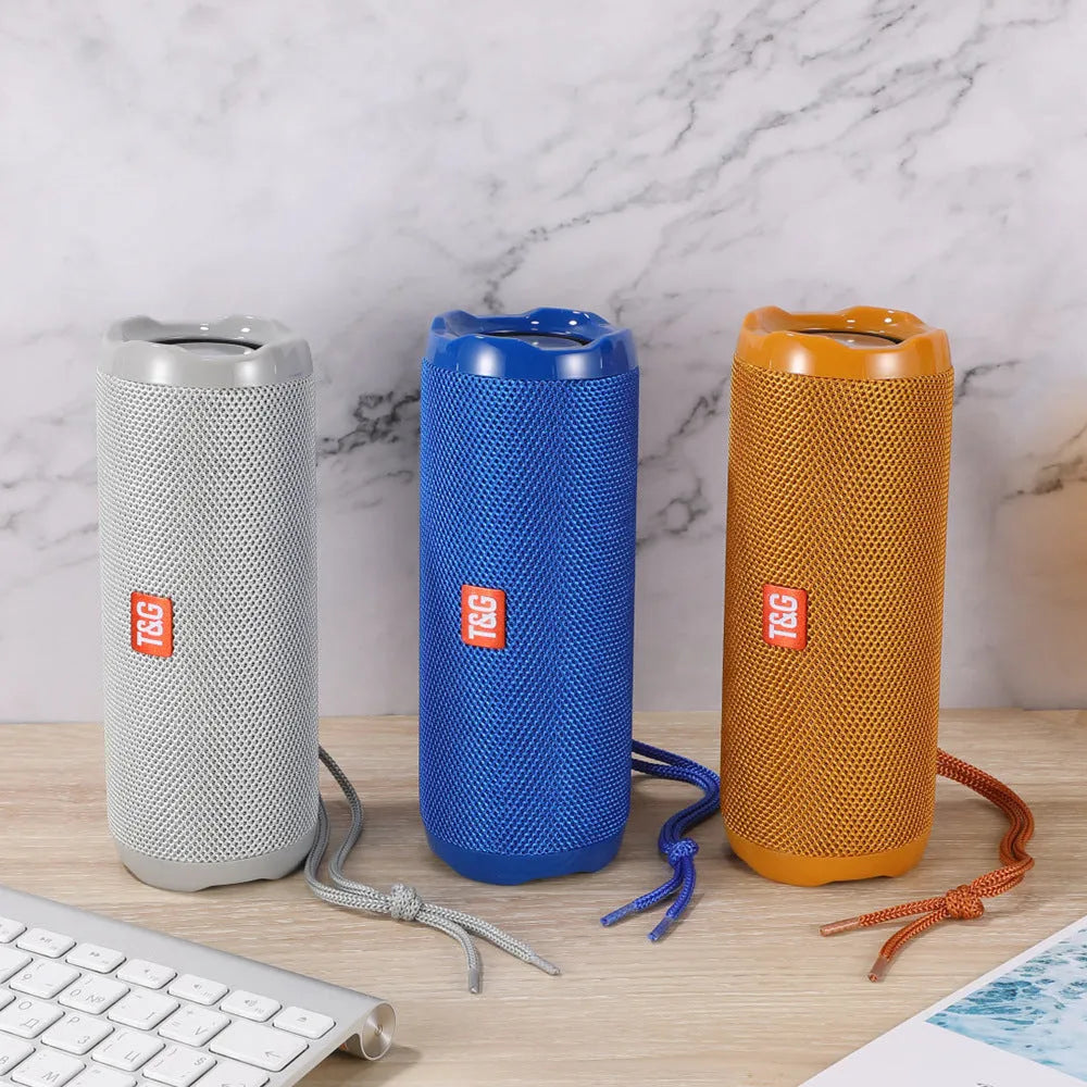 Portable Bluetooth speaker with card holder in multiple colour options including blue, black, and camouflage.