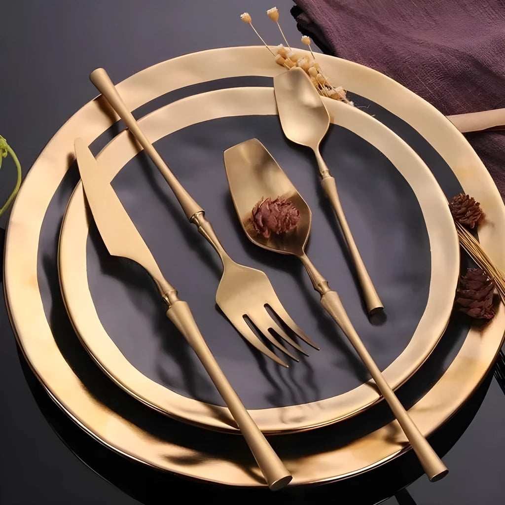 Four-piece stainless steel cutlery set with main knife, main fork, main spoon and teaspoon for gift-giving occasions
