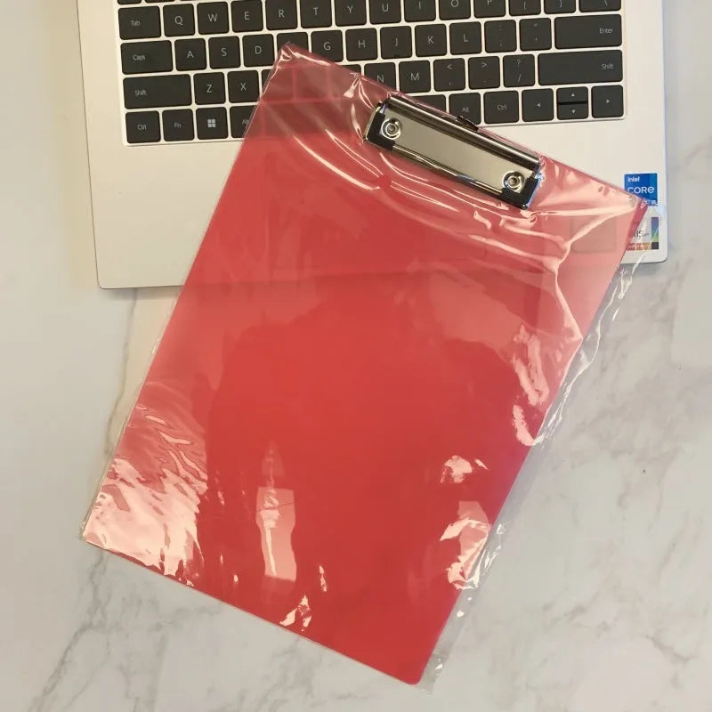 Transparent A4 plastic clipboard with metal clip in blue, green, red or white colour options