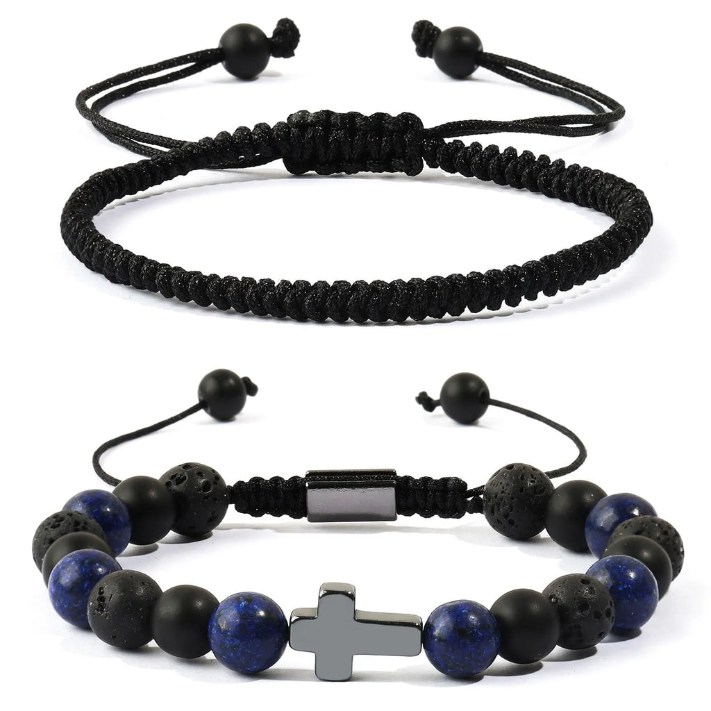 Hand-woven cross bracelet set with lapis lazuli and black matte volcanic stone beads in blue or black rope braid
