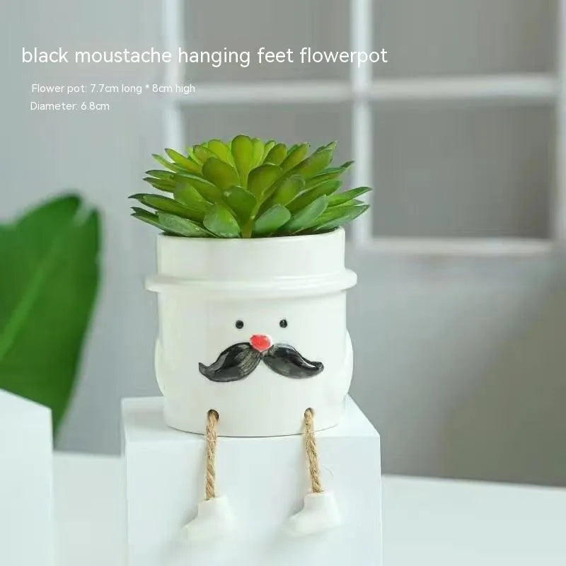 Ceramic hanging foot flowerpot in cartoon style for succulent plants on desktop