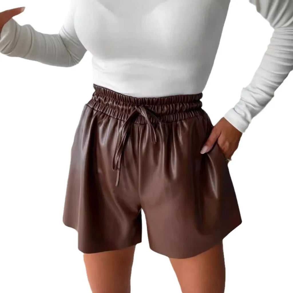 Women's black drawstring lace-up waist wide-leg casual shorts made of PU leather-look polyester spandex.