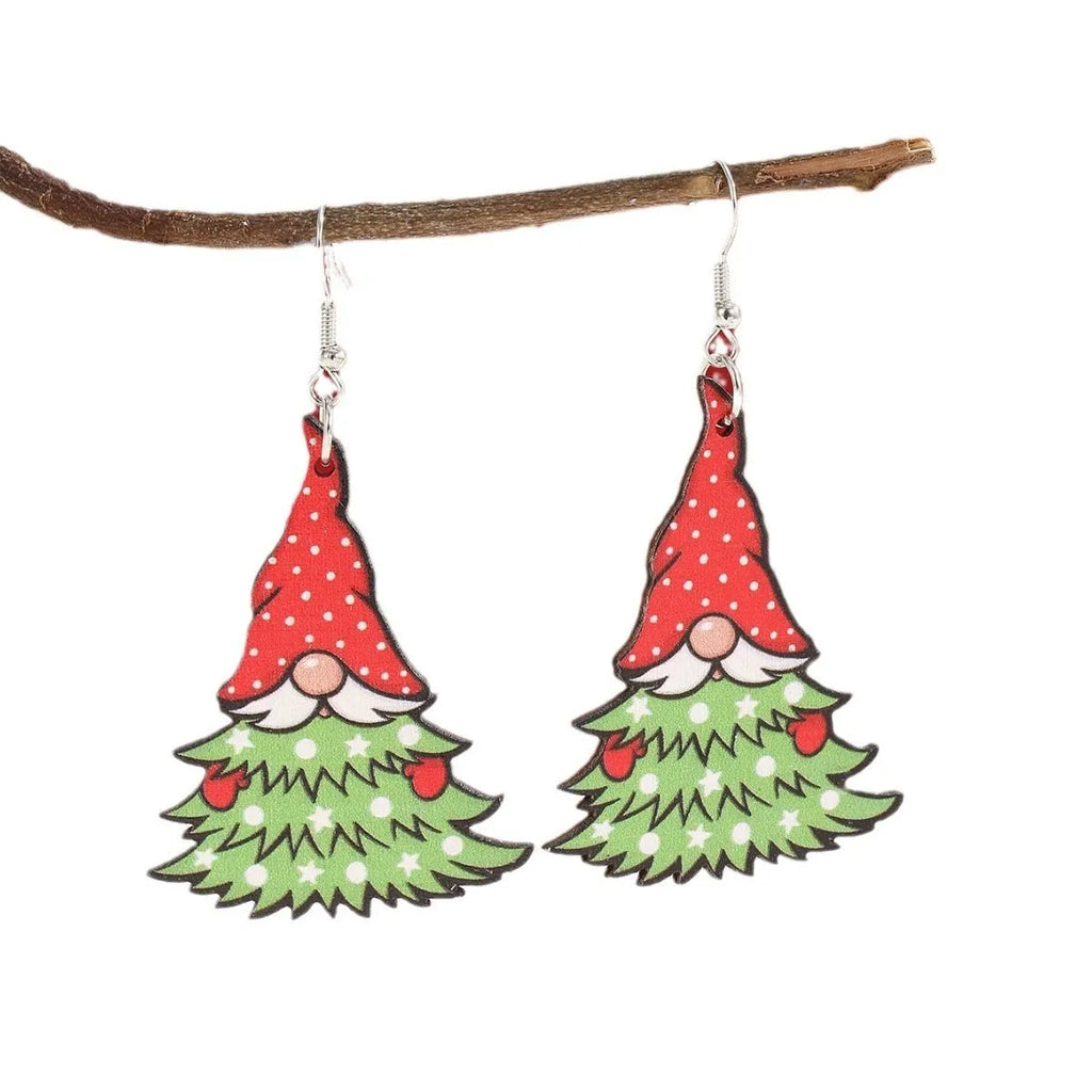 Wooden geometric earrings with printed Christmas tree and snowman Santa Claus designs.
