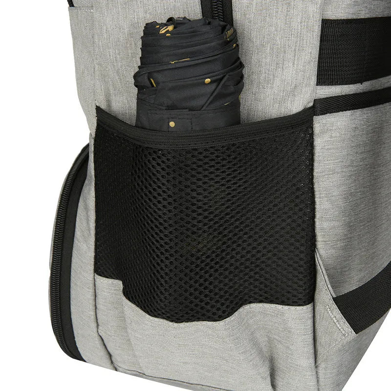 Light grey insulated oxford cloth backpack with curved shoulder straps showing dry-wet separation compartments